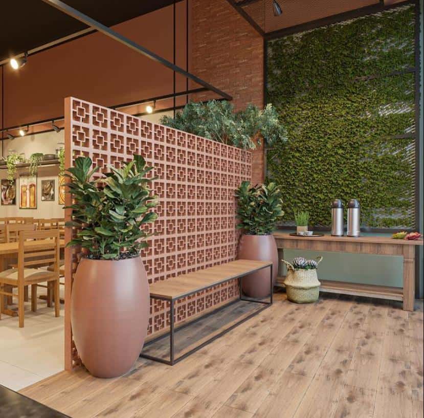 parede de cobogós divindindo ambientes em um restaurante